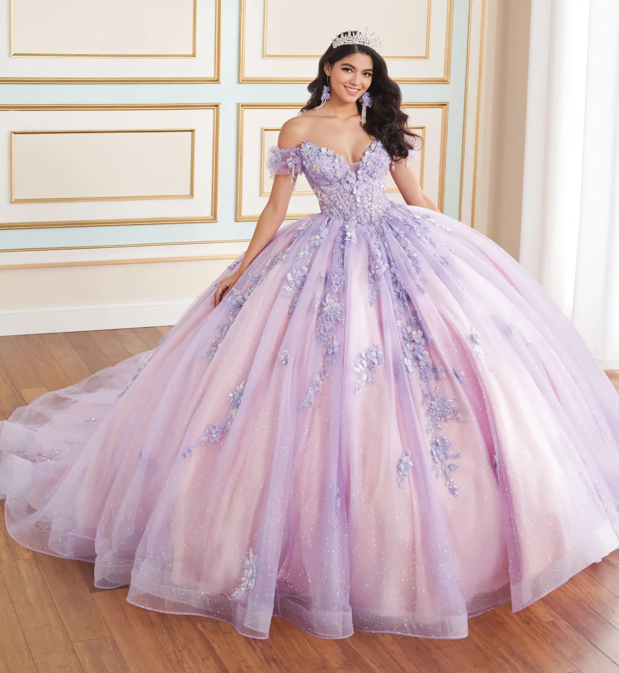 model is wearing a purple and pink quince gown