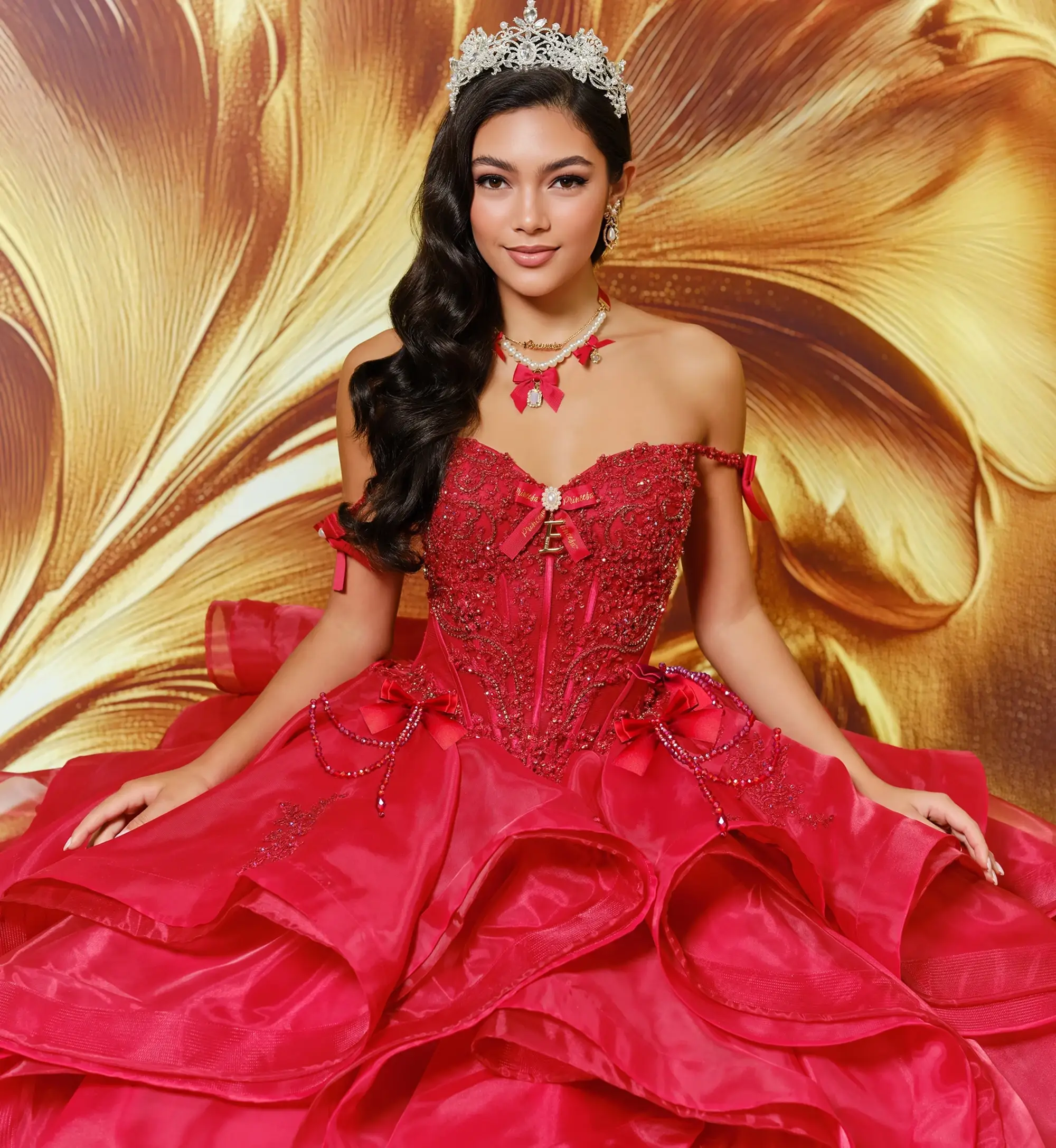 model is wearing an off the shoulder red quince gown