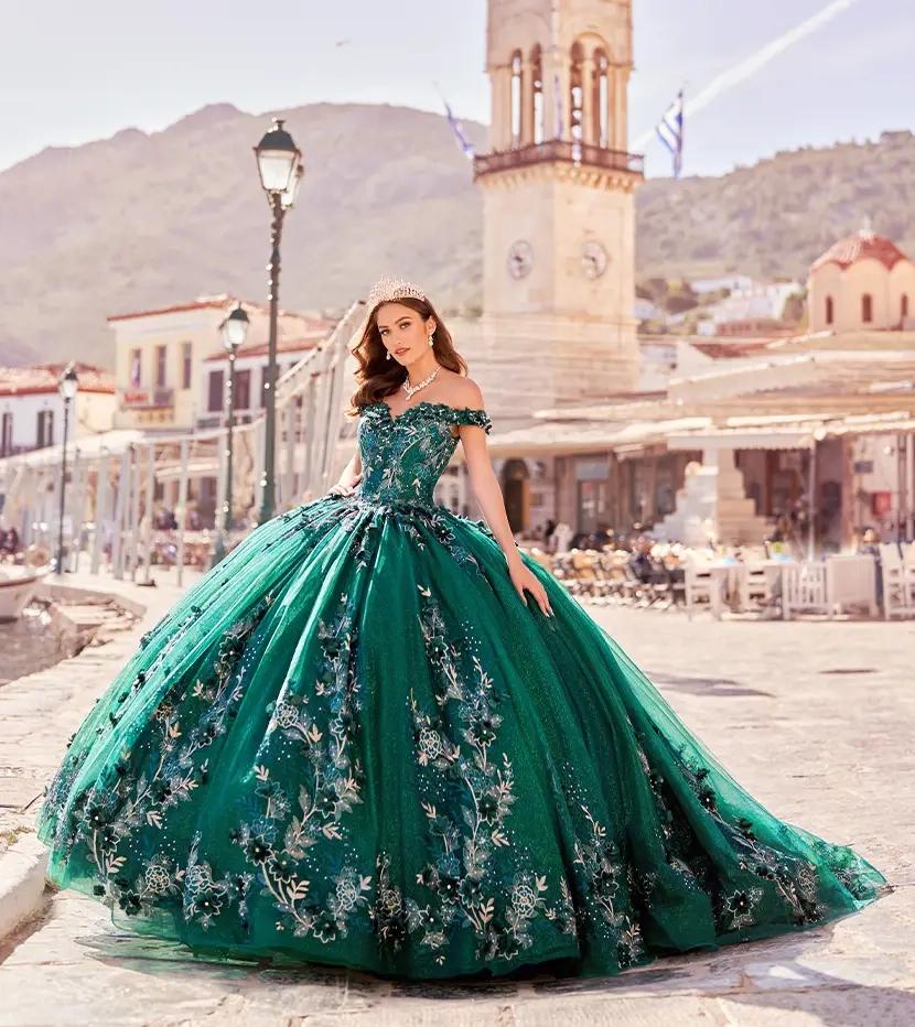 Model wearing a green quinceanera dress by Princesa by Ariana Vara