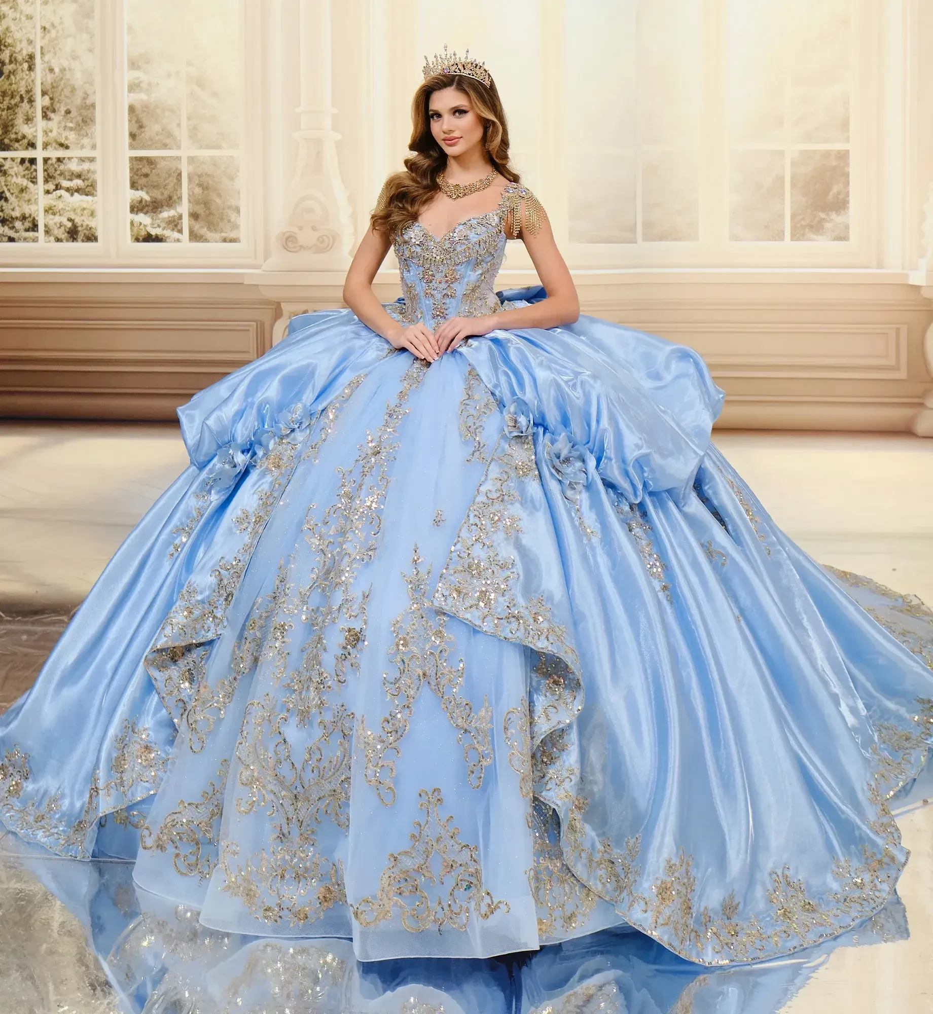 model is wearing a light blue and gold quinceanera dress