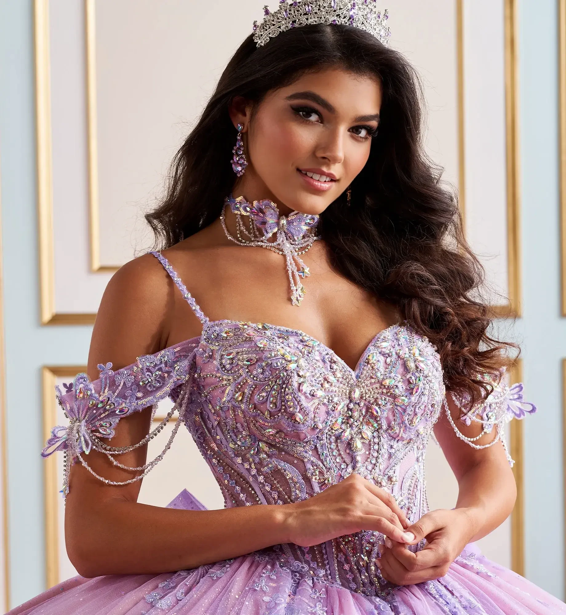 model is wearing an off the shoulder lavender wedding dress