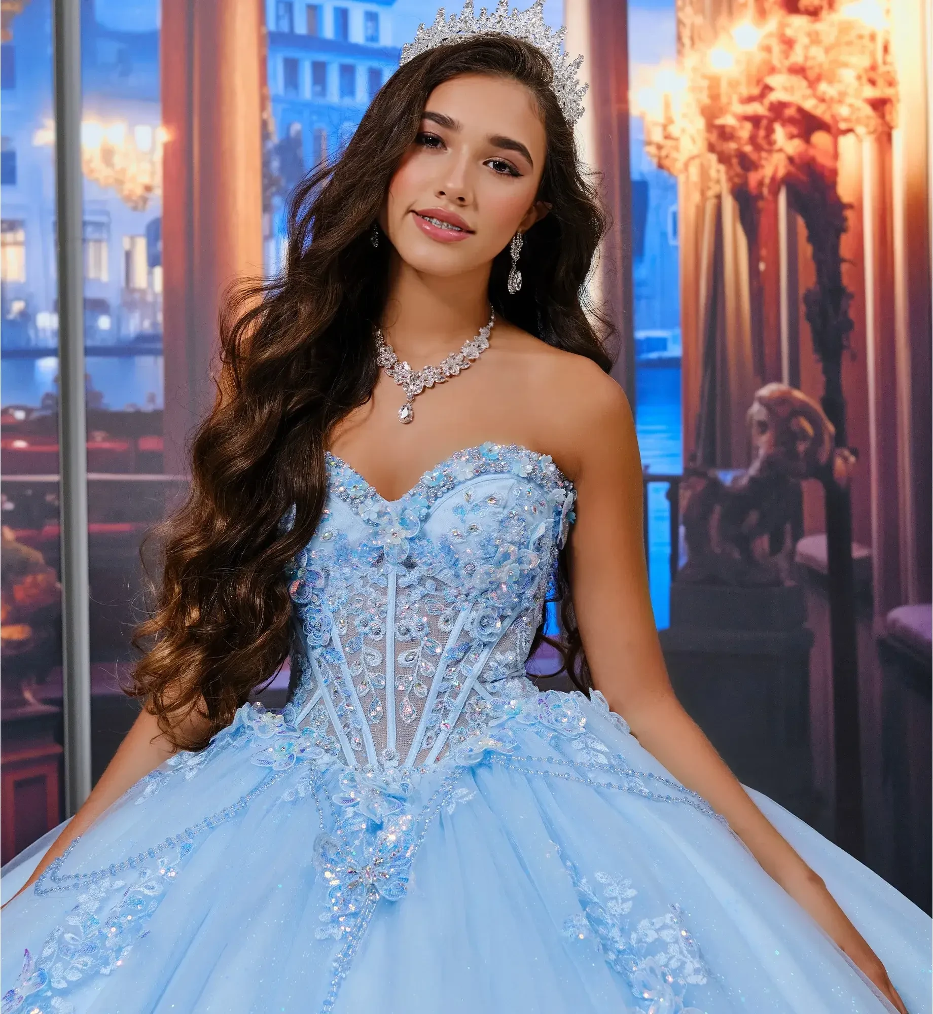 model is wearing a strapless light blue quinceanera dress