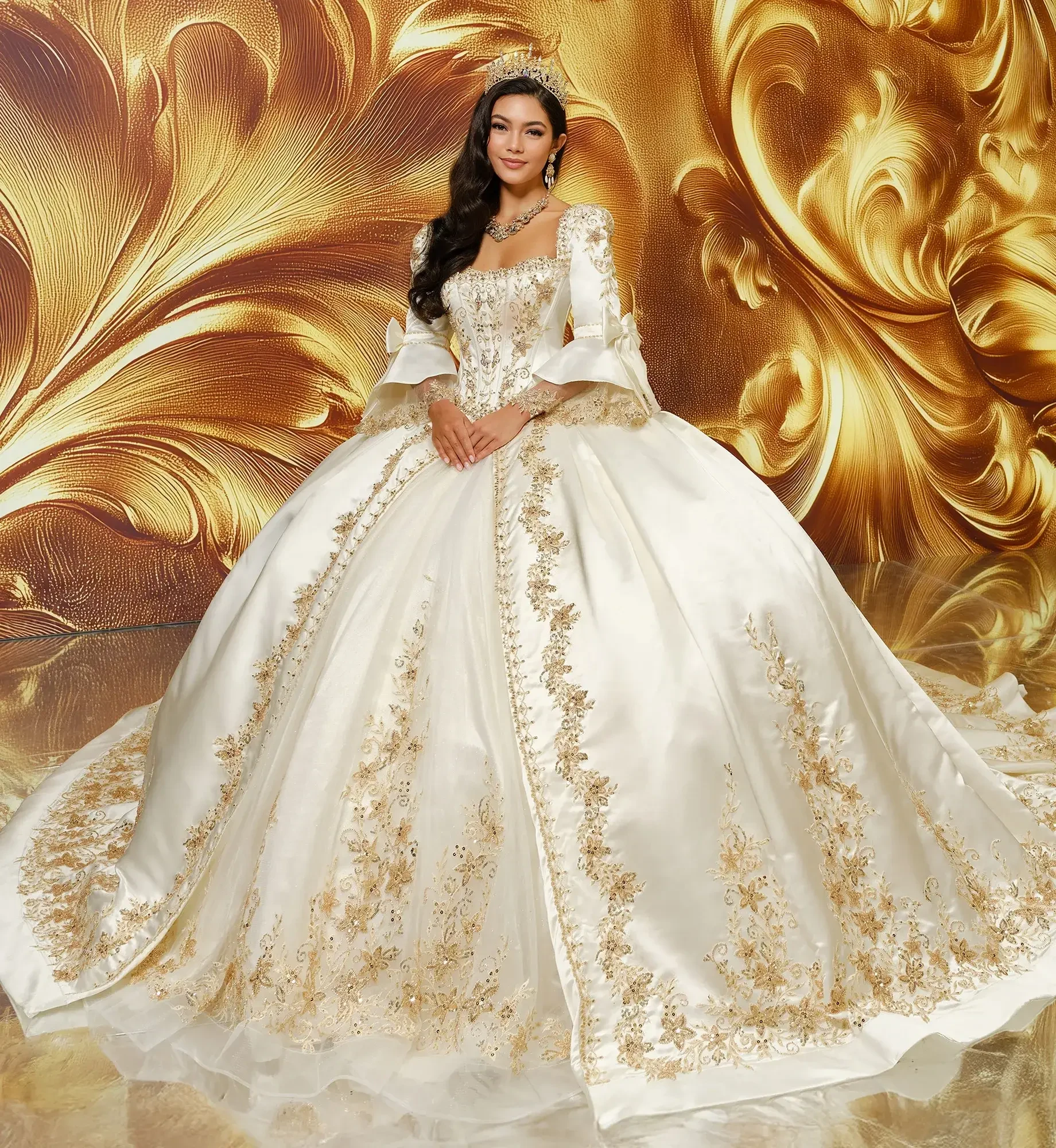model is wearing a gold strapless quinceanera gown with a corset jacket