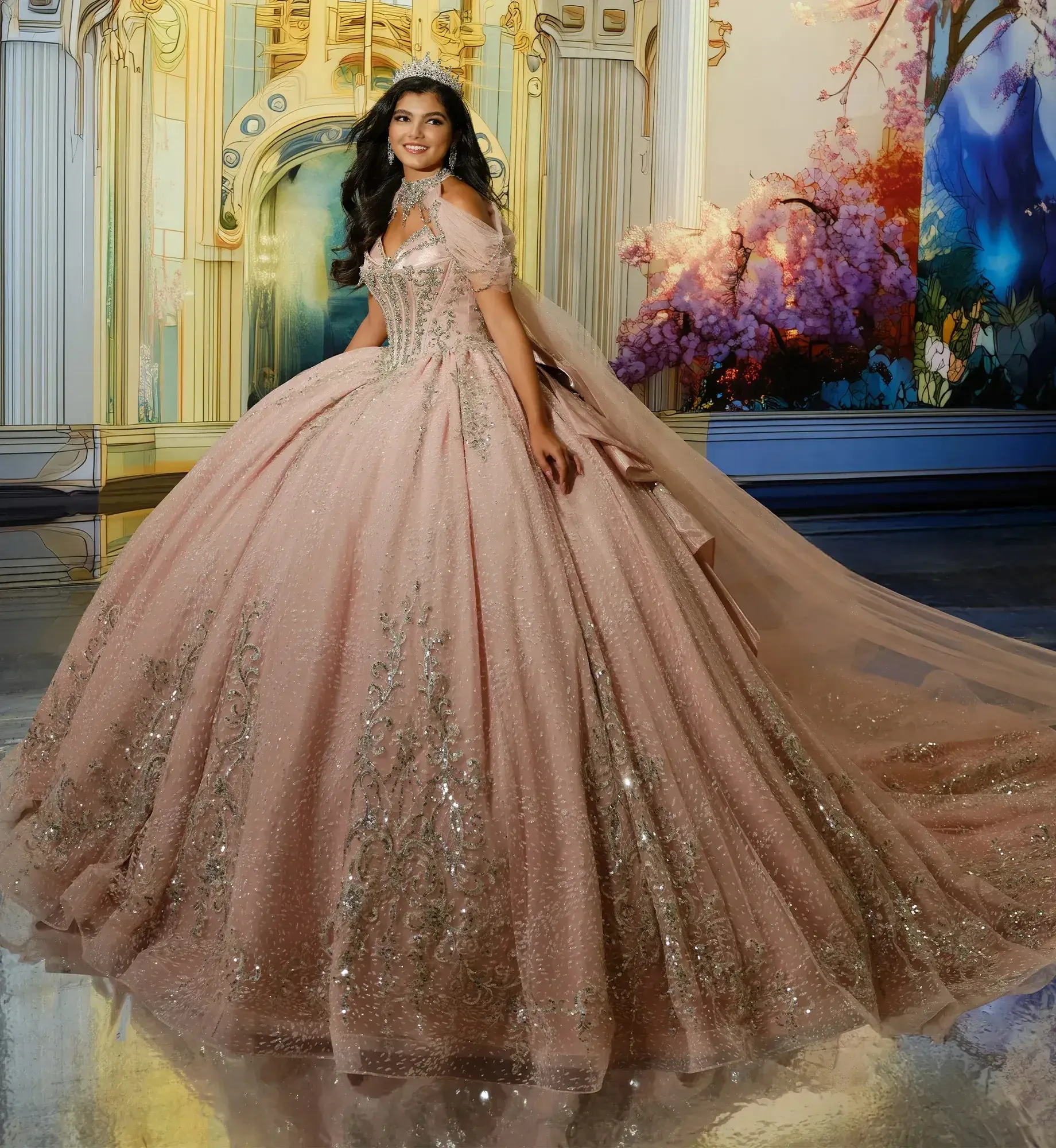 A woman in an elegant, sparkling pink ball gown stands smiling against an ornate backdrop with floral and architectural details, evoking a fairytale atmosphere.