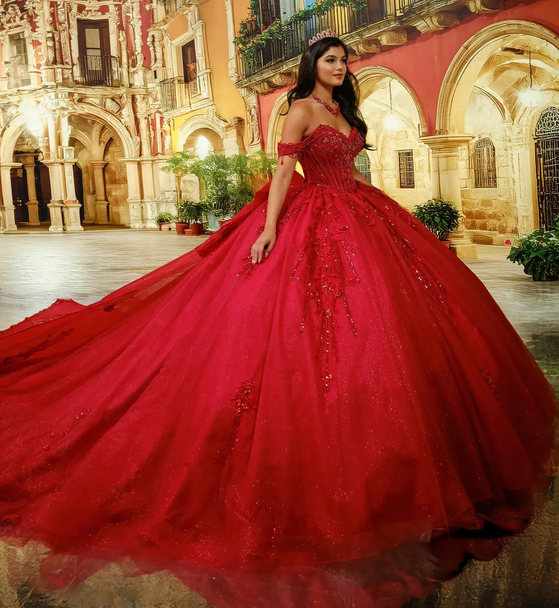 A woman in a lavish red gown stands gracefully in an ornate setting, featuring historical architecture and greenery. The gown has intricate details and a flowing train.