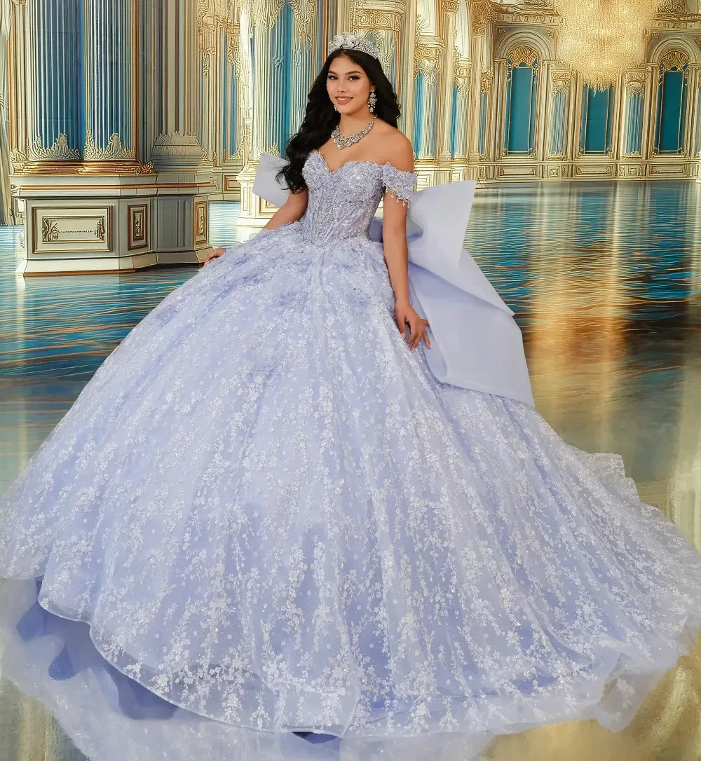 model is wearing an off the shoulder light purple quince gown