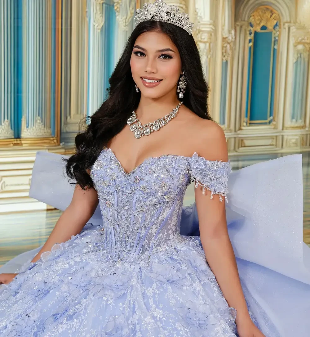 model is wearing an off the shoulder light purple quince gown