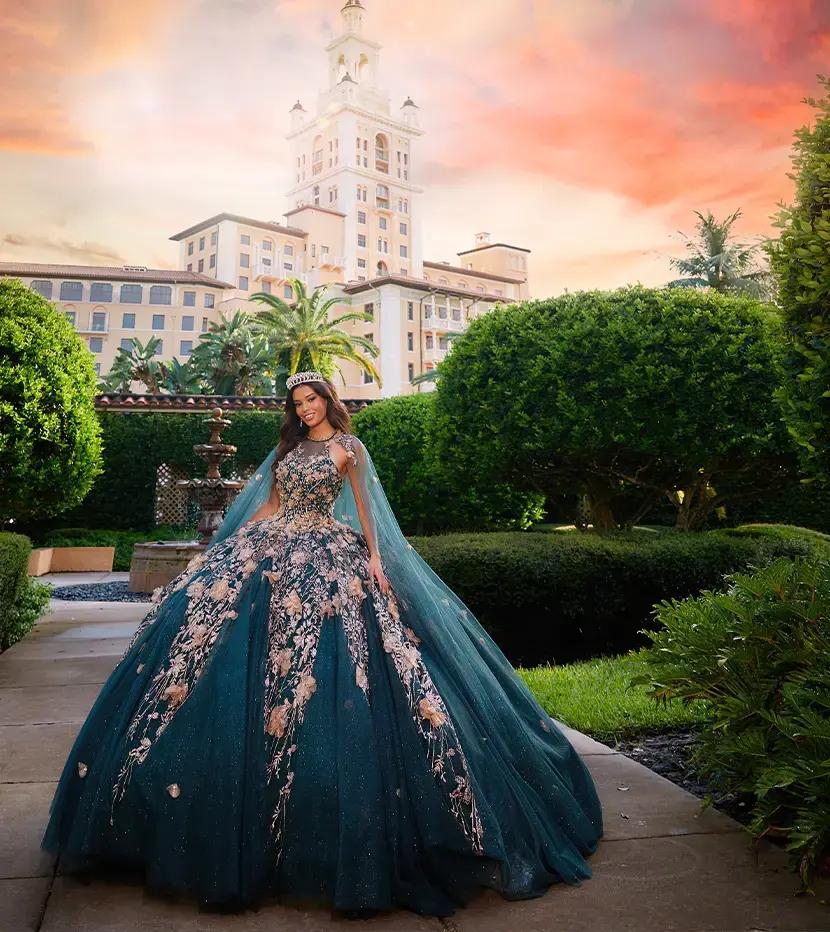 Model wearing a blue quinceanera dress by Princesa by Ariana Vara