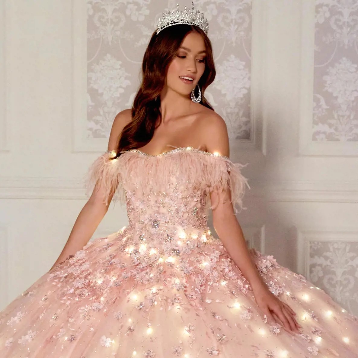 Model wearing a pink Quinceanera dress