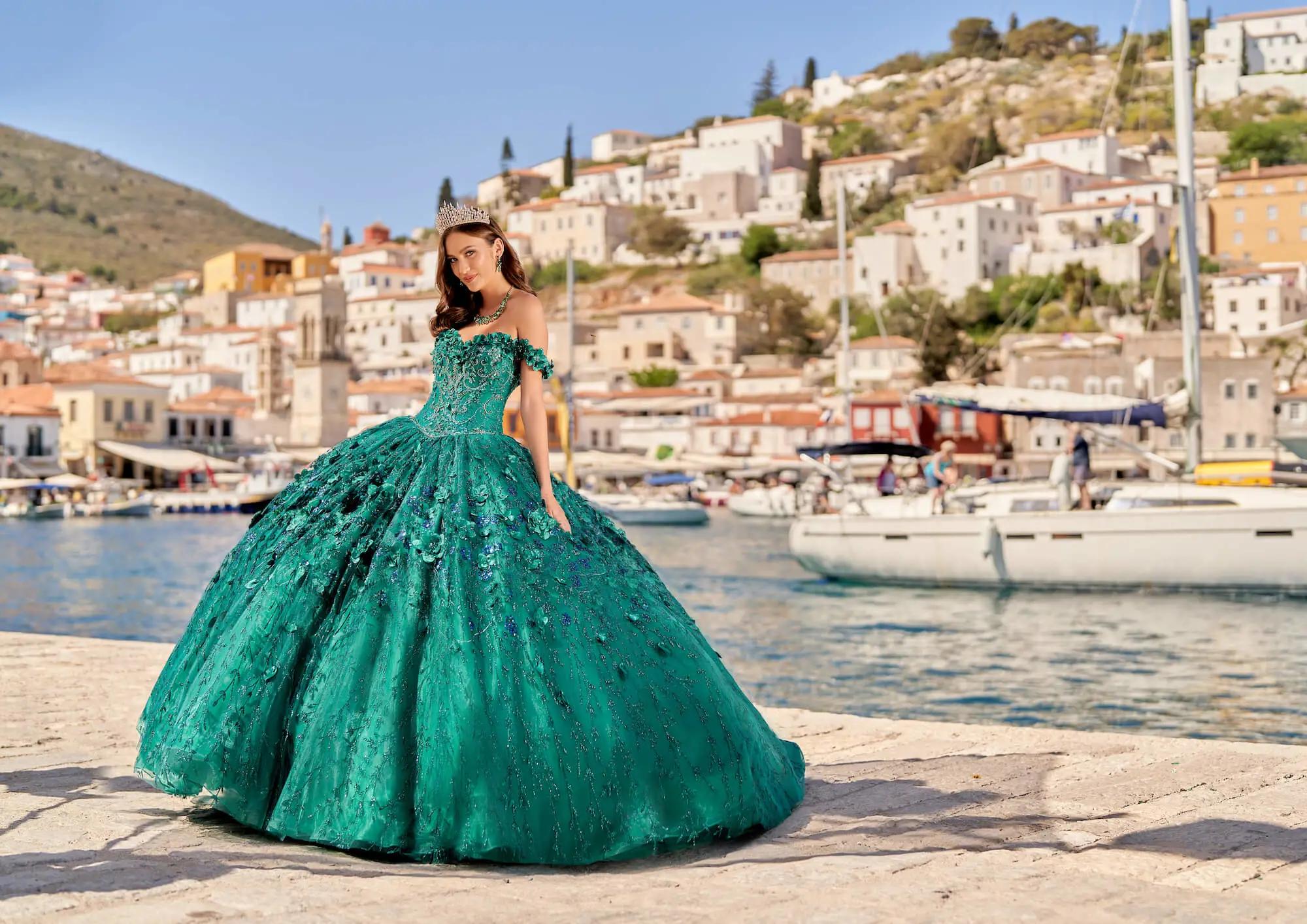 Brunette model in green quinceañera dress with floral cape