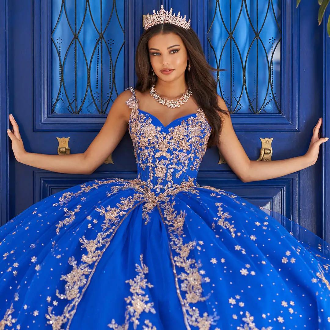 Model in royal blue Princesa by Ariana Vara quinceañera dress