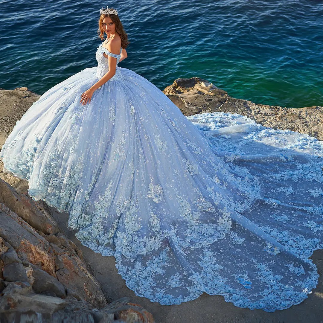 Model in light blue Princesa by Ariana Vara quinceañera dress